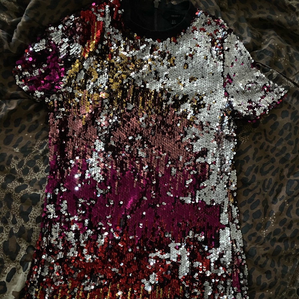 Shine bright like a diamond in this sequin dress